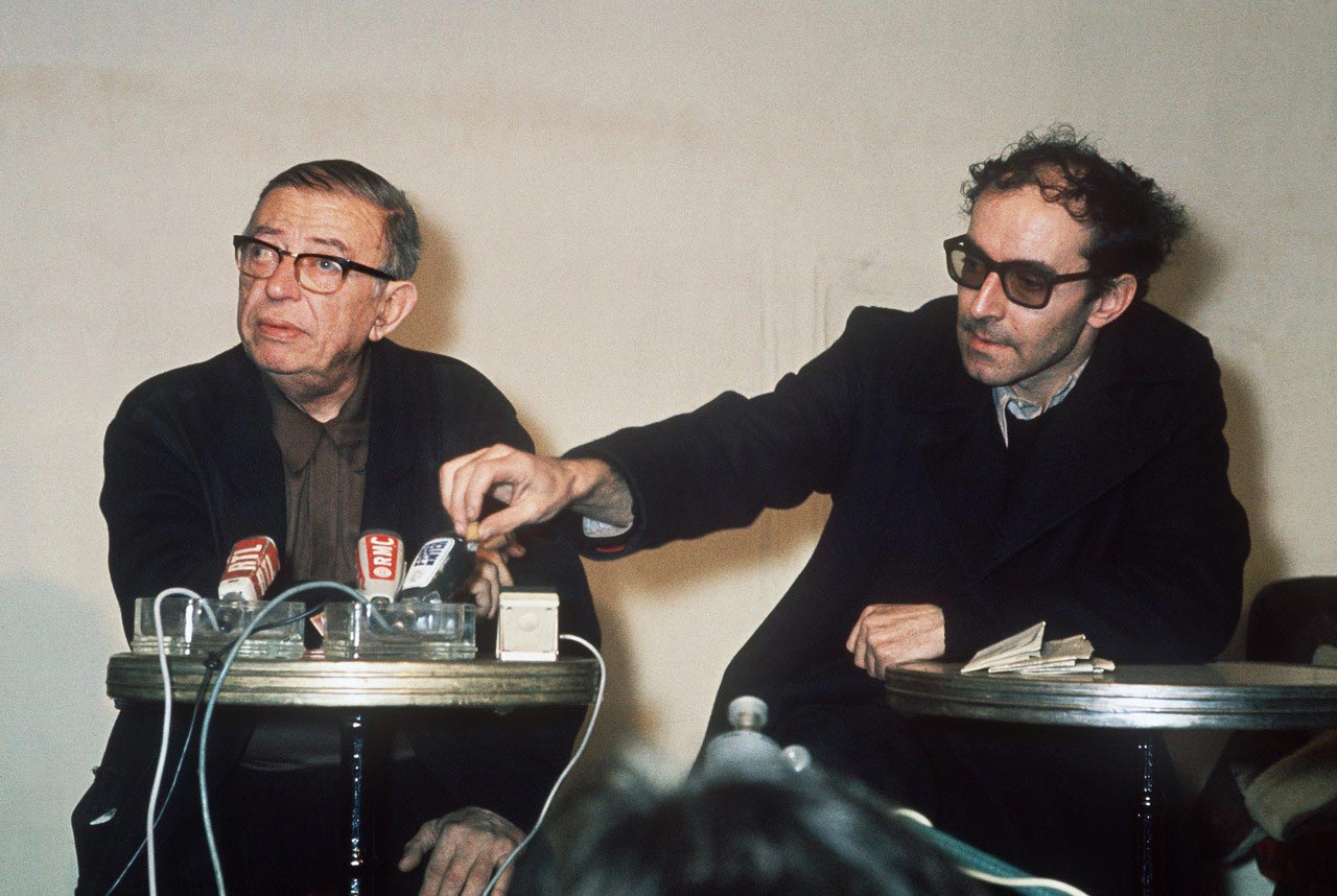 Sartre tillsammans med vännen och filmregissören Jean-Luc Godard.